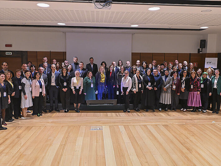 Several people pose for a group photo