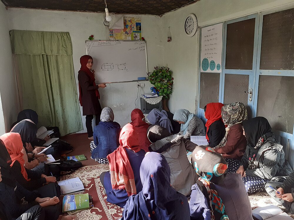 Teacher with a group of women in Afghanistan