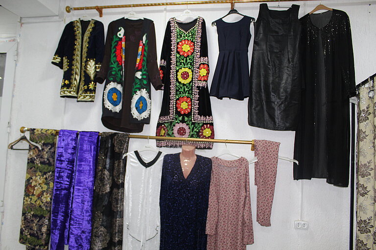 Clothes that have been created in the sewing workshop.