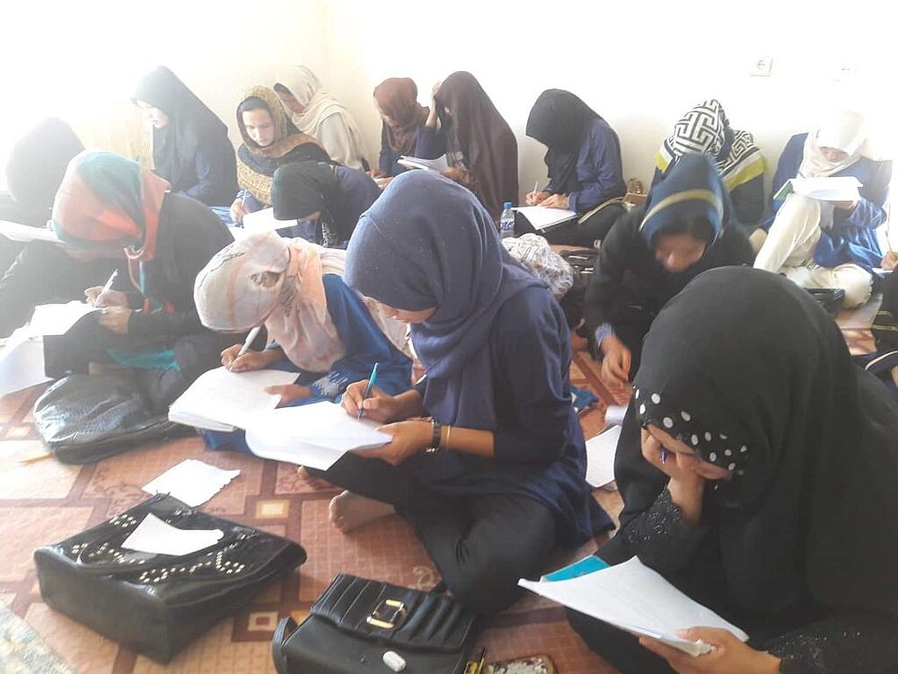Afghanistan. A group of women learning. 