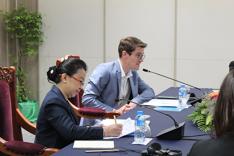 Dr Silinthone Sacklockham, Head of Department International Relations at the Lao Ministry of Education, and Dr Johann Heilmann, Regional Director of DVV International Southeast Asia