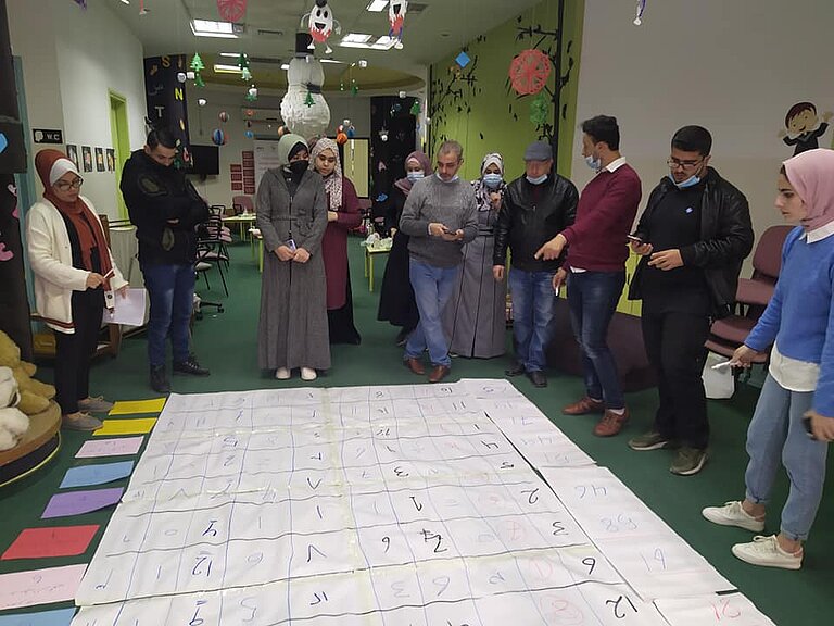 Identifying community training needs at the Community Center for Youth and Adult Education at At-Faluna Society for Deaf Children in Gaza.