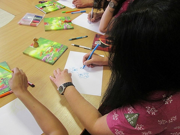 Women drawing pictures